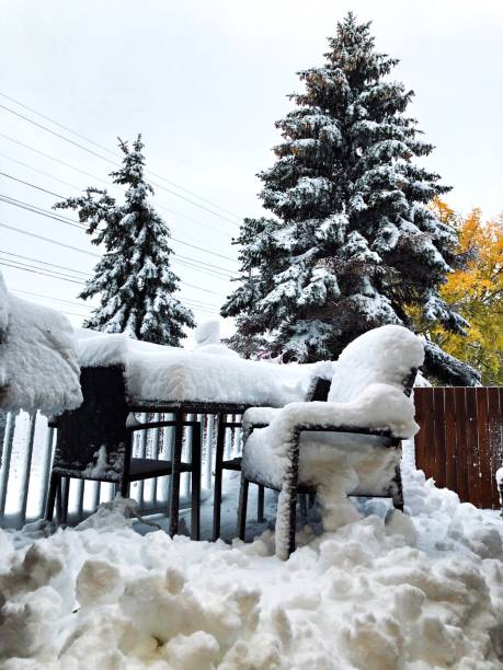 istock Patio Furniture Covered With Snow 1180461499