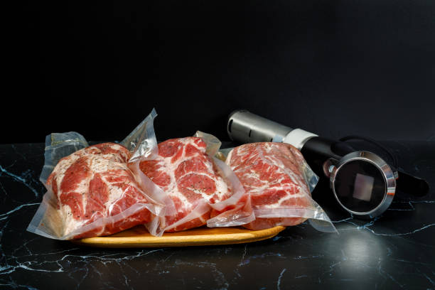 istock Sous Vide Cooker Immersion Circulator and meat . 1180468724