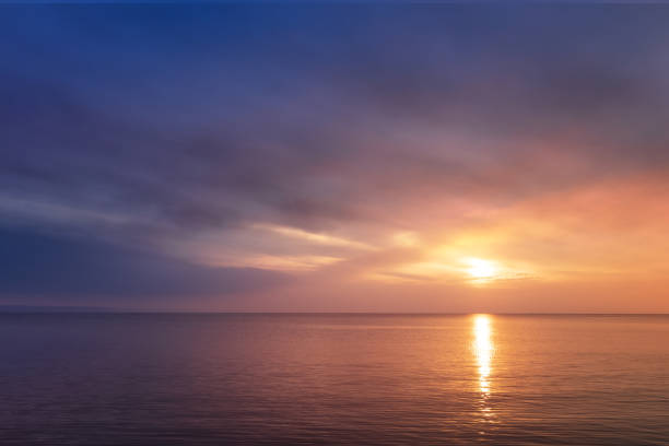istock early morning sunrise on a choppy river 1180469942
