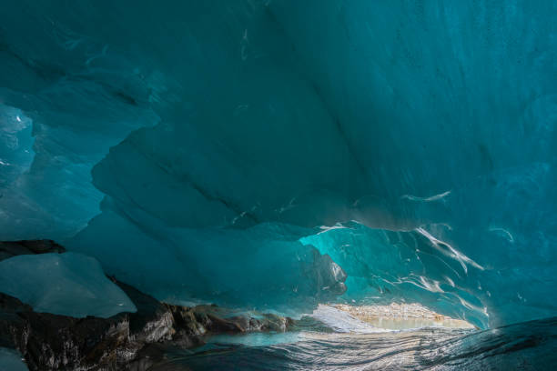istock beautiful blue ice glacier cave grotto inside the mountain glacier 1180473601