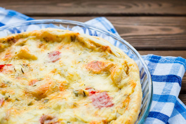 istock Rustic large tart with cloth on a wooden table, view from above, close-up 1180473929