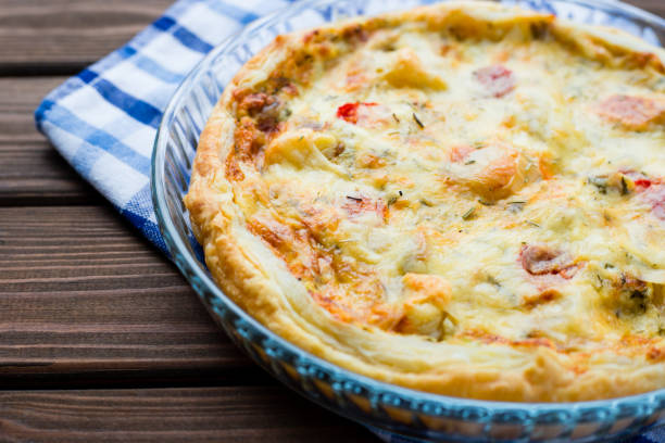 istock Rustic large tart with cloth on a wooden table, view from above, close-up 1180473941