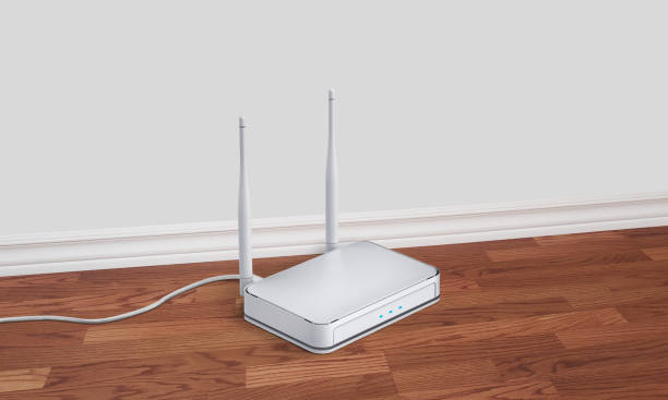 bezprzewodowy router internetowy wifi na podłodze - modem wireless technology wlan communication zdjęcia i obrazy z banku zdjęć