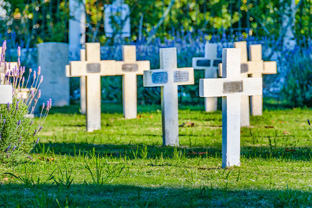 White crosses on green grass at World War II cemetery,Colleville-sur Mer,France.