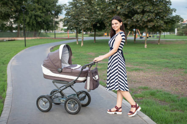 istock Young mother with baby boy on nature 1180480268