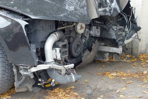 istock disassembled broken front part of a black passenger car 1180481387