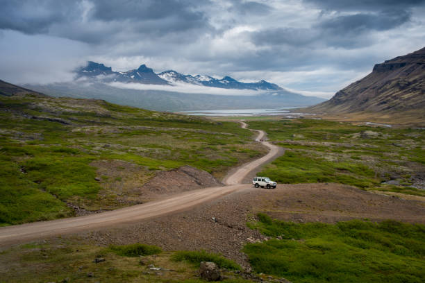 istock White Off-road car on the icelandic road. 1180482131