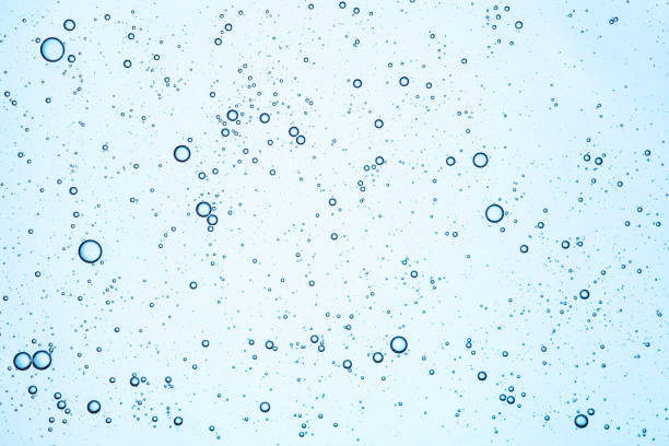 istock Liquid gel or serum on microscope screen isolated background 1180483272