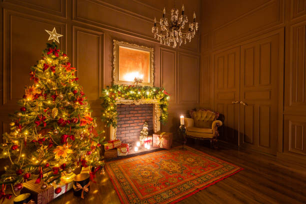 istock Christmas evening by candlelight. classic apartments with a fireplace, decorated tree, armchair. 1180484892
