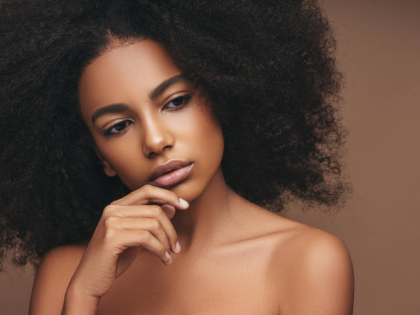 istock Beautiful girl with curly hairstyle 1180485002
