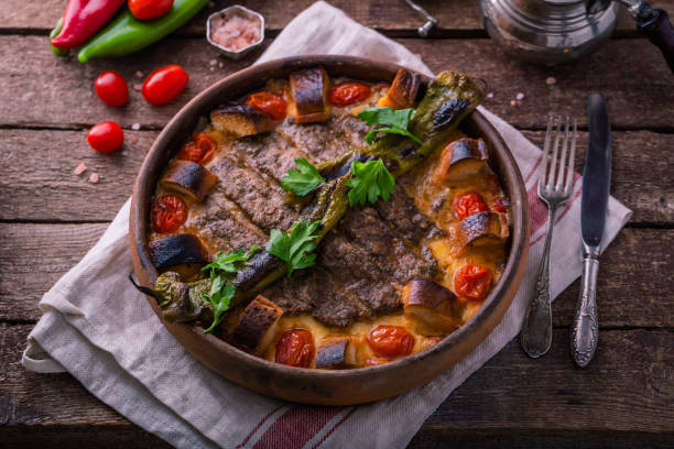 istock Minced meat kebab in a pot with vegetables and bread 1180485283
