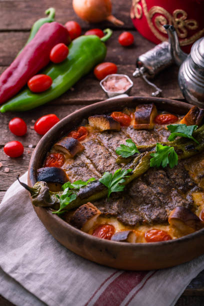istock Minced meat kebab in a pot with vegetables and bread 1180485284
