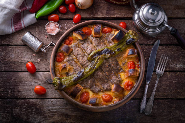 istock Minced meat kebab in a pot with vegetables and bread 1180485285