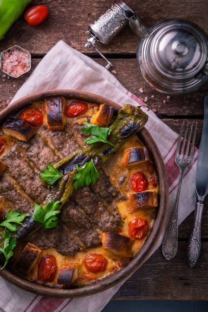 istock Minced meat kebab in a pot with vegetables and bread 1180485294