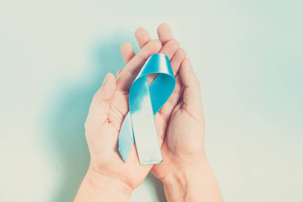 istock Hand holding Diabetes Awareness Blue Ribbon 1180485320