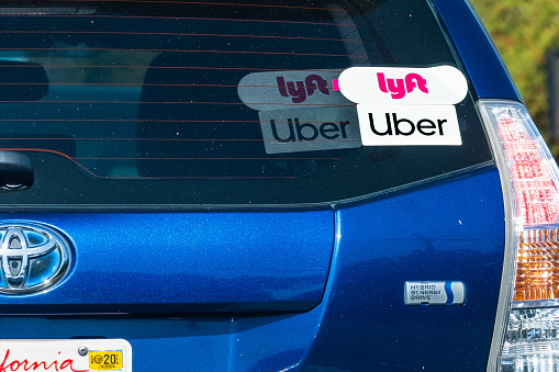 Oct 10, 2019 Mountain View / CA / USA - Toyota Prius Hybrid vehicle offering rides for UBER and LYFT in San Francisco Bay Area