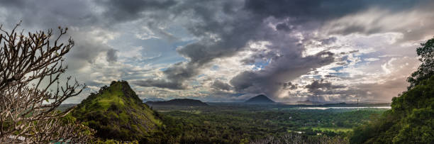 istock Panoramic view of the valley in front of the Buddhist cave complex in Dambulla. 1180497365
