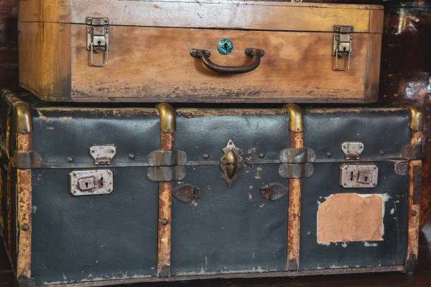 istock very old suitcases standing in a row 1180498844