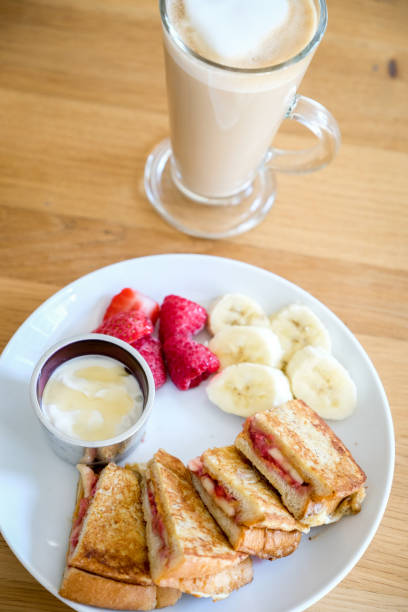 istock French toast sandwich with peanut butter, banana, and raspberry for breakfast 1180503571