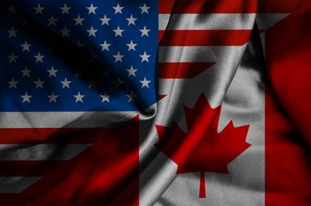 istock Waving flag of Canada and USA 1180503621