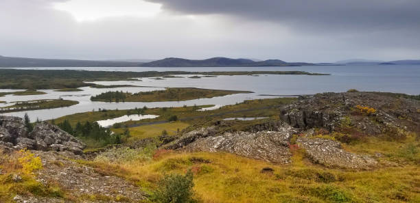 Þingvellir (Thingvellir), Iceland: A panoramic view across the Rift Valley (and lake) in Thingvellir National Park, a UNESCO World Heritage site where the North American and Eurasian tectonic plates are rifting apart.