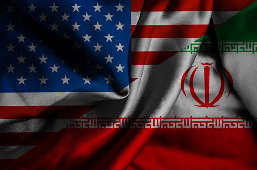 Waving flag of Iran and USA