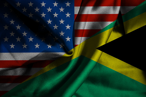 Waving flag of Jamaica and USA