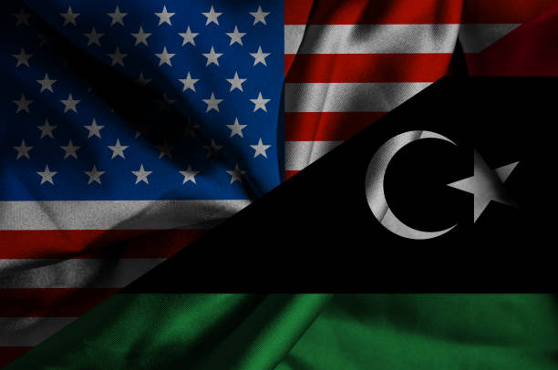 istock Waving flag of Libya and USA 1180506800