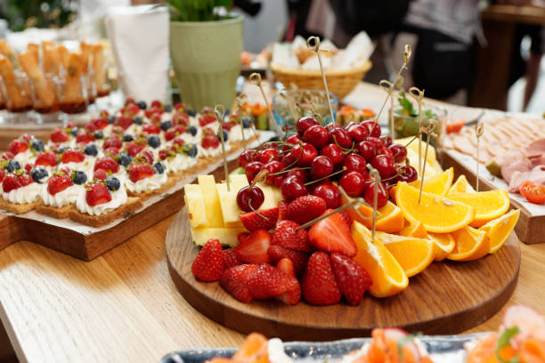istock Fruits, berries and dessert on restaurant table 1180509585