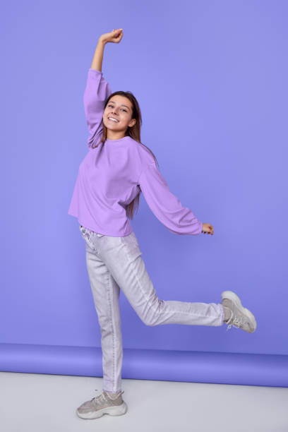 istock Happy young woman stretching arms 1180509882
