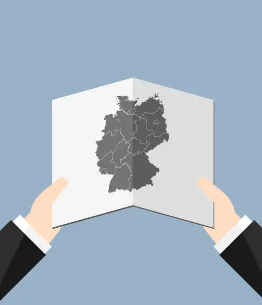 Vector illustration of A Man Holding a Germany Map