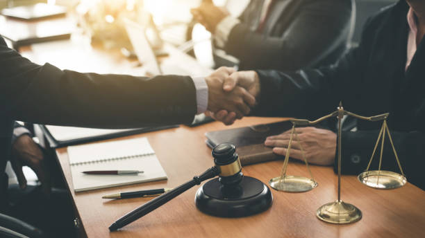 istock Businessman shaking hands discussing a contract agreement. 1180522075