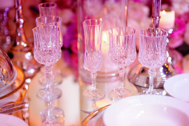 istock Beautiful table setting with crockery and flowers for a party, wedding reception or other festive event 1180523003