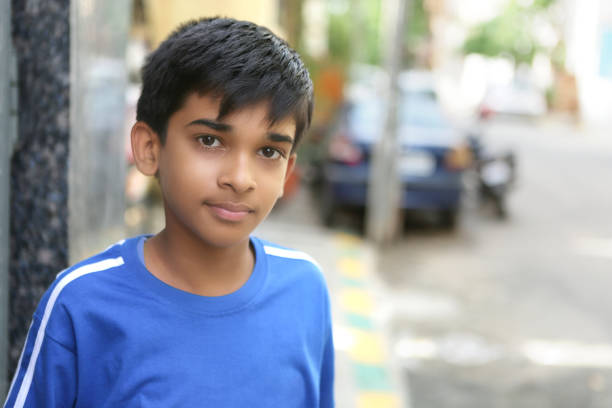 istock Portrait of Indian boy posing to camera 1180528430