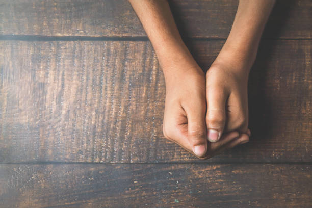 istock Emotional young boy hand holding together 1180528780