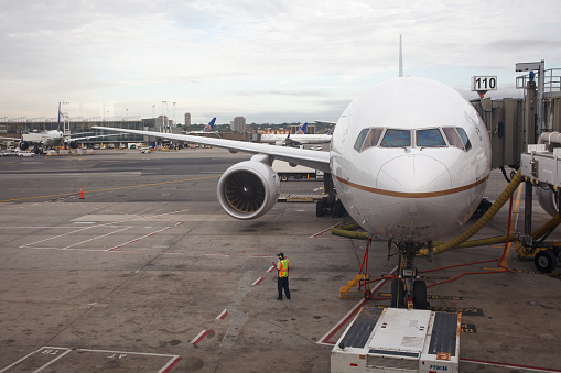 Newark, New Jersey / U.S.A. - September 30 2019: An image of a commercial jet parked at gate 110 at Newark Liberty International Airport.