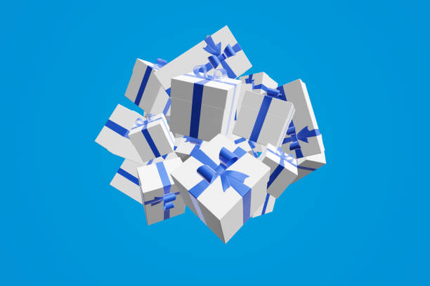 istock 3d rendering explosion gifts boxes fly on a blue background. Gift surprise for Christmas, New Year, Valentine's Day. 1180539542