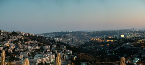 Jerusalem City At Dusk With Clear Skies Jerusalem City At Dusk With Clear Skies pool of siloam stock pictures, royalty-free photos & images