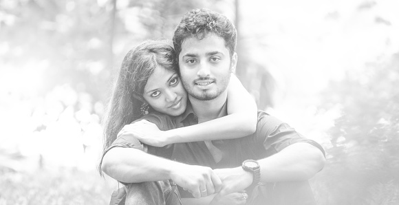 Indian Young couple hugging each other at park
