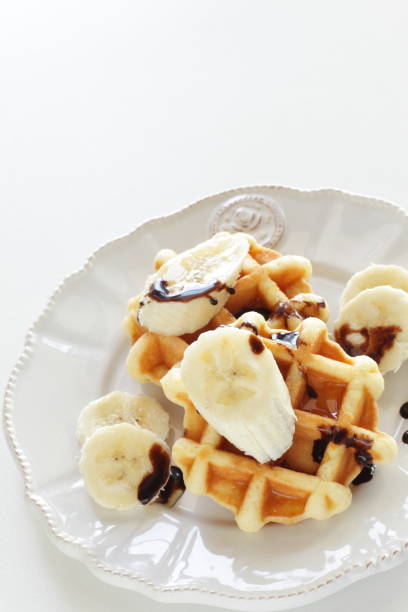 istock banana and waffle on dish 1180541588