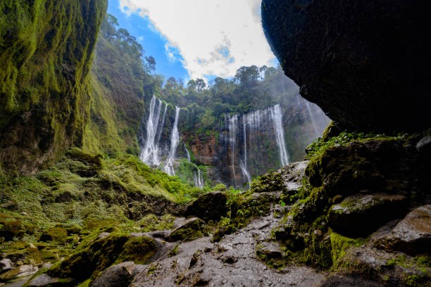 istock Inside the canyon of the Tumpak Sewu waterfall on Java Indonesia 1180542152