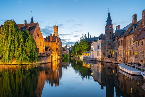 Bruges skyline with old buildings at twilight in Bruges, Belgium.