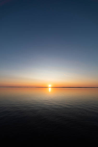 istock Calm serene sunrise lake scenery 1180547470