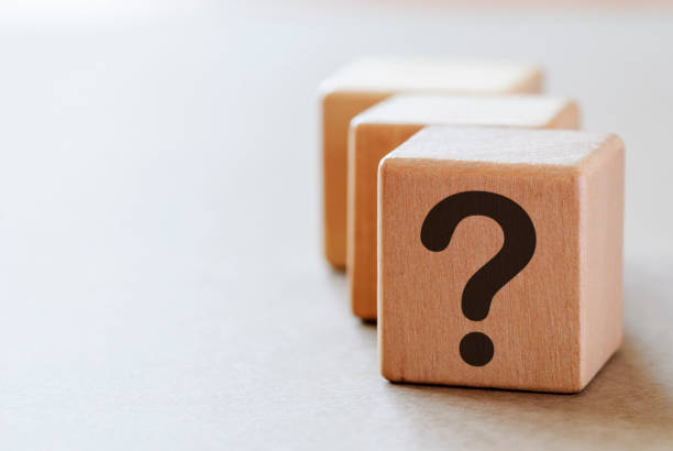 istock Question mark on small wooden dices 1180548347