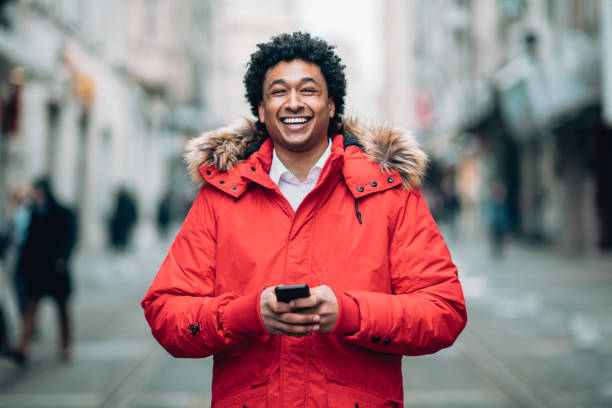 istock Photo of a man using smart phone 1180552598