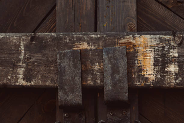 istock old wooden gate with a bolt 1180554216