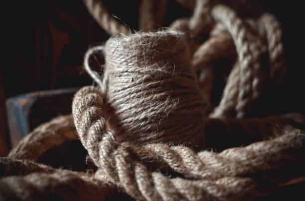 istock Spool of natural twine among hemp ropes. 1180556918