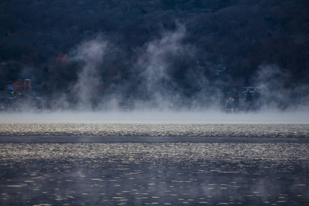 istock Lake and morning fog 1180559108