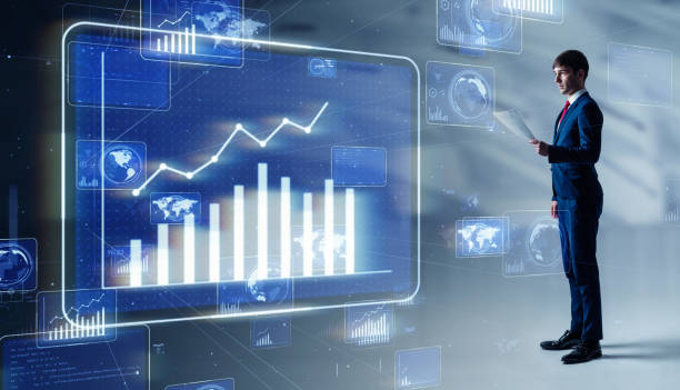 istock Businessman looking at a chart. Financial planner. FIntech. 1180562797