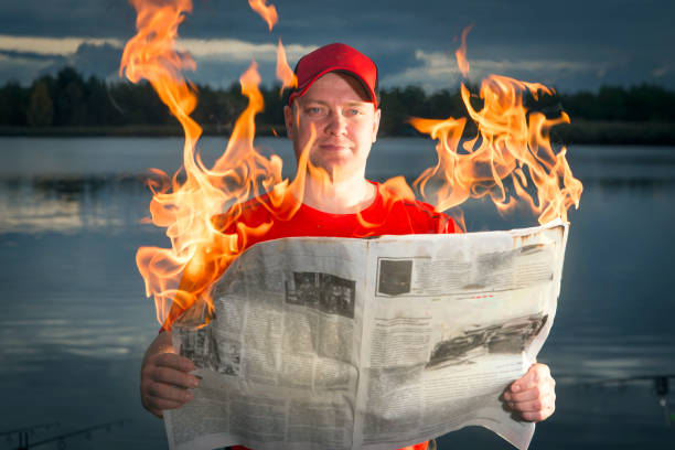 istock A man reads the latest news. 1180563043